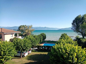 Casa Lugana 10 - monolocale con piscina direttamente a lago